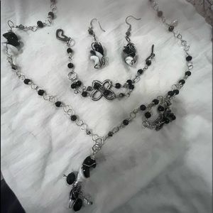 Set of necklace, earrings and bracelet